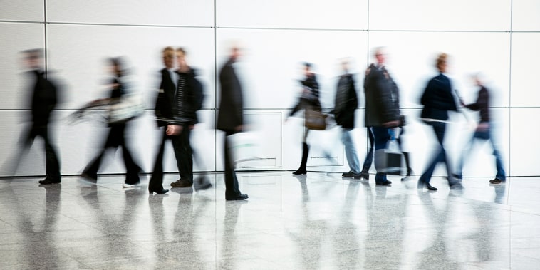 Commuters Walking in Corridor, Blurred Motion