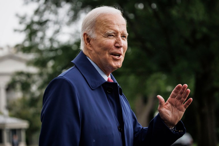 President Joe Biden speaks to members of the media on the South Lawn of the White House before boarding Marine One on May 29, 2023.